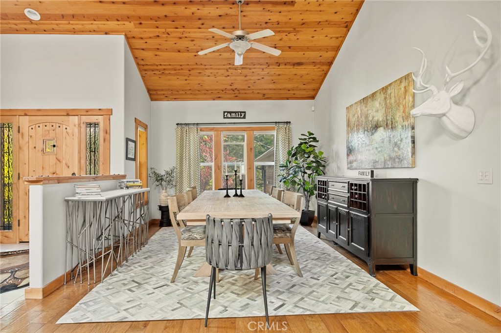 523 Dogwood Canyon Road Blue Jay, CA 92317 - Photo 12 of 33 a dining room with furniture and wooden floor
