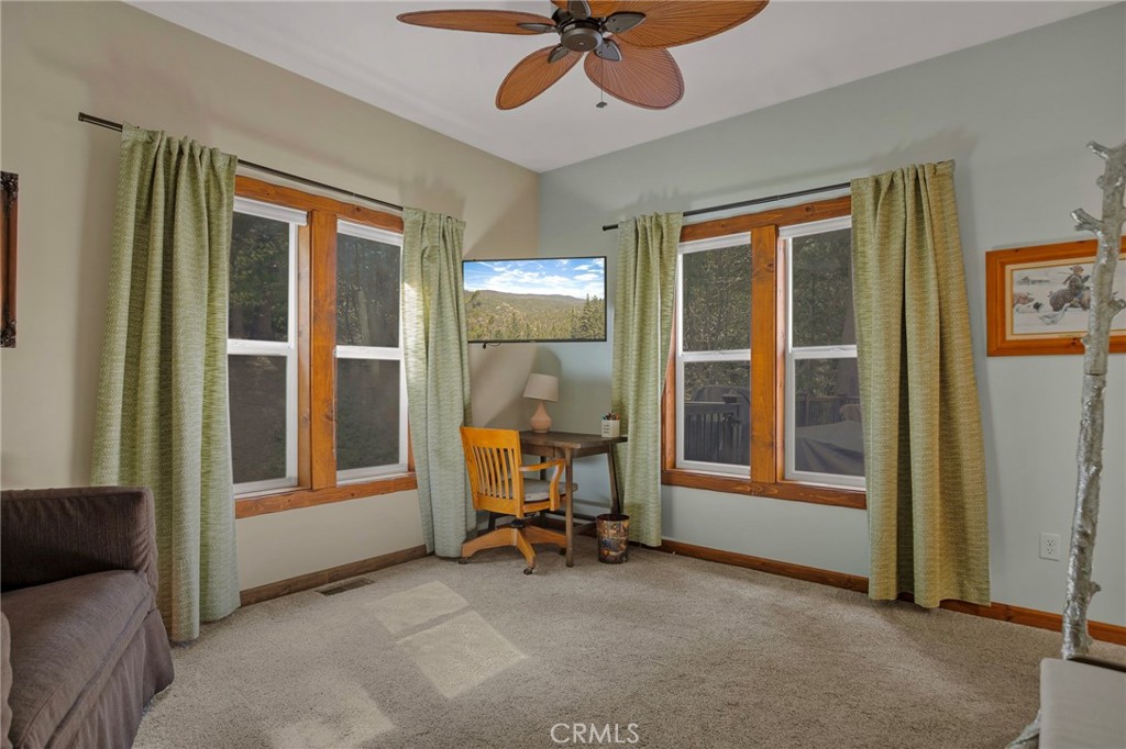 523 Dogwood Canyon Road Blue Jay, CA 92317 - Photo 21 of 33 a view of a livingroom with furniture and a window