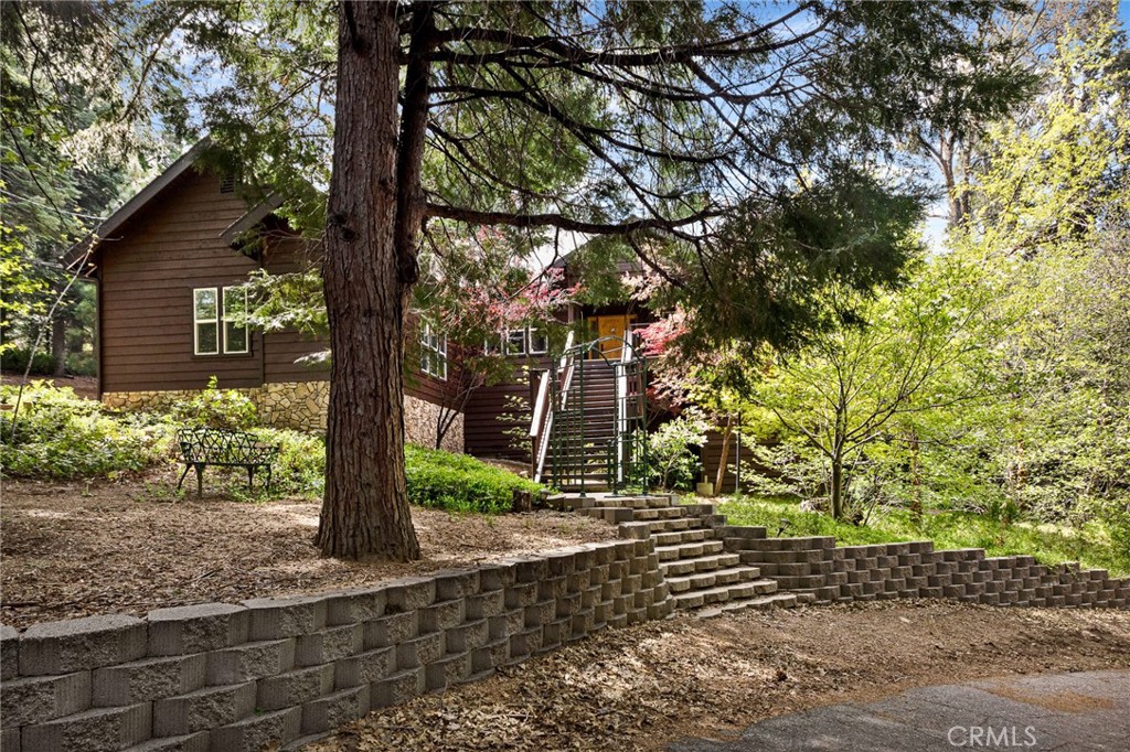 523 Dogwood Canyon Road Blue Jay, CA 92317 - Photo 29 of 33 a pathway of a house with a yard