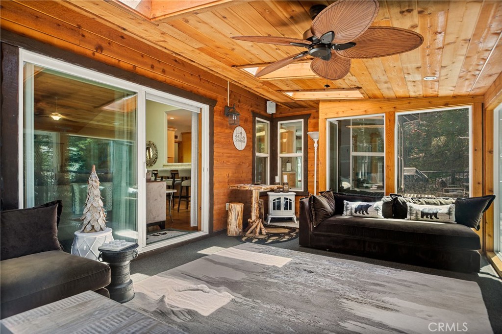523 Dogwood Canyon Road Blue Jay, CA 92317 - Photo 7 of 33 a living room with furniture and a large window