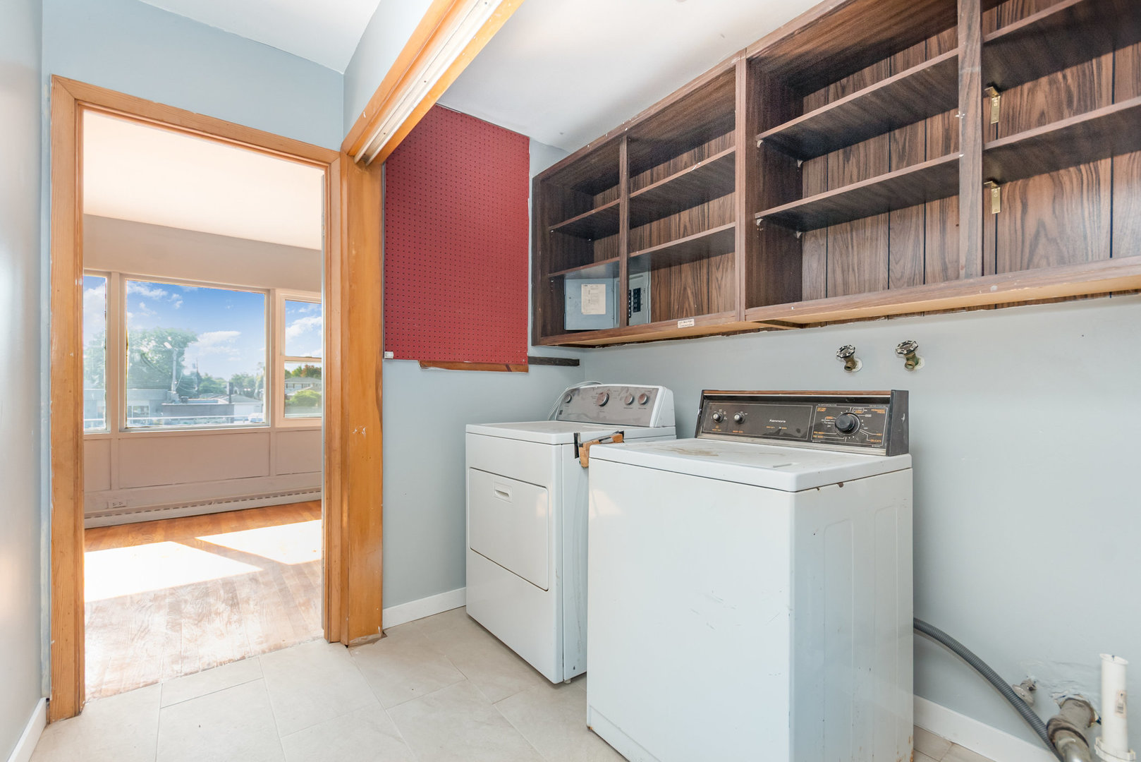 10448 West Cermak Road, Unit 1F Westchester, IL 60154 - Photo 9 of 9 a utility room with dryer and washer