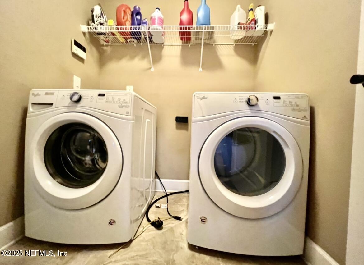 1024 Ardmore Street St. Augustine, FL 32092 - Photo 25 of 25 a utility room with dryer and washer