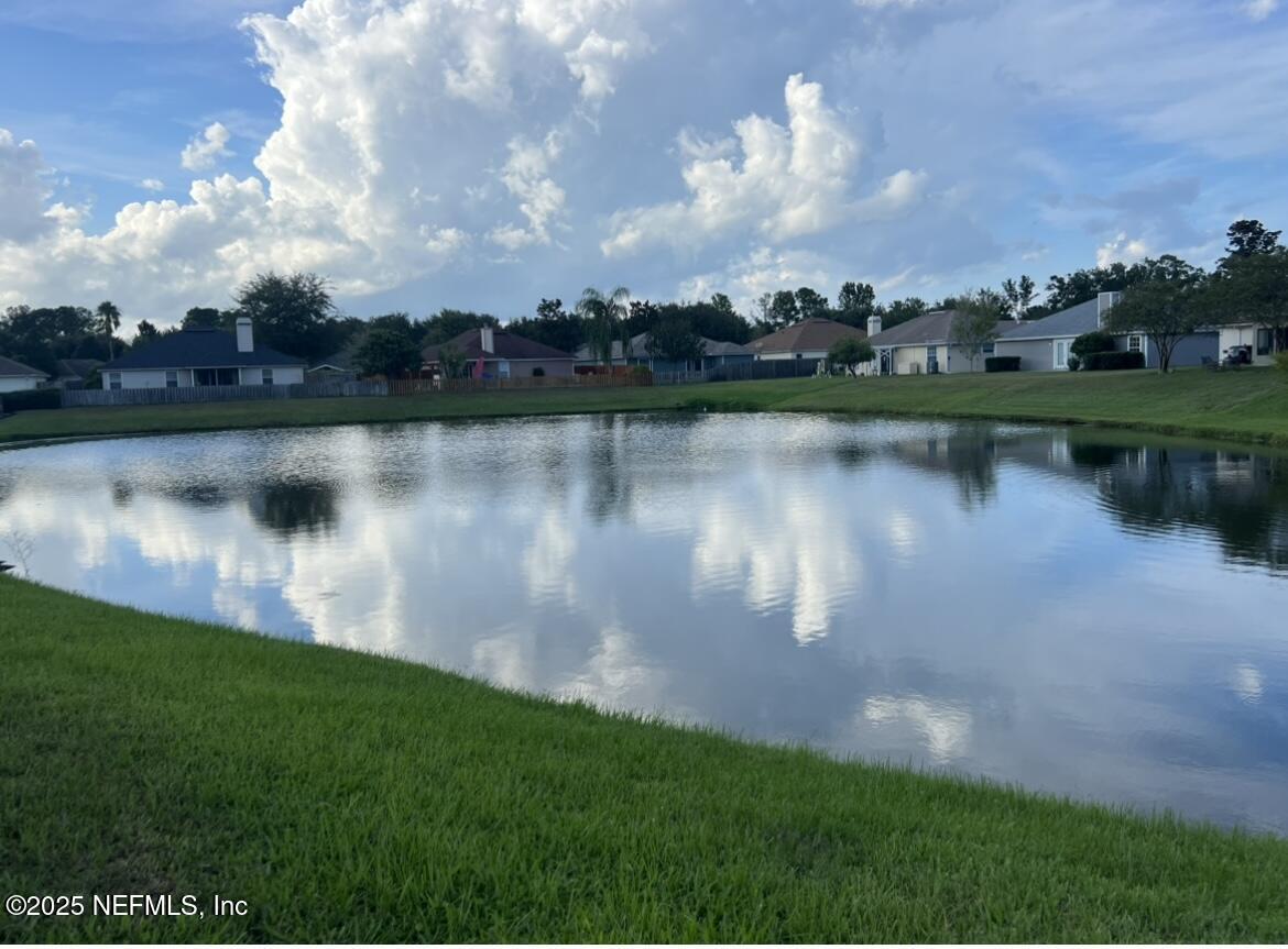 1024 Ardmore Street St. Augustine, FL 32092 - Photo 4 of 25 a view of a lake with a city