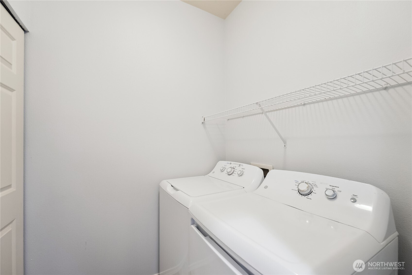 405 South 47th Street, Unit 405 Renton, WA 98055 - Photo 27 of 30 a utility room with dryer and washer
