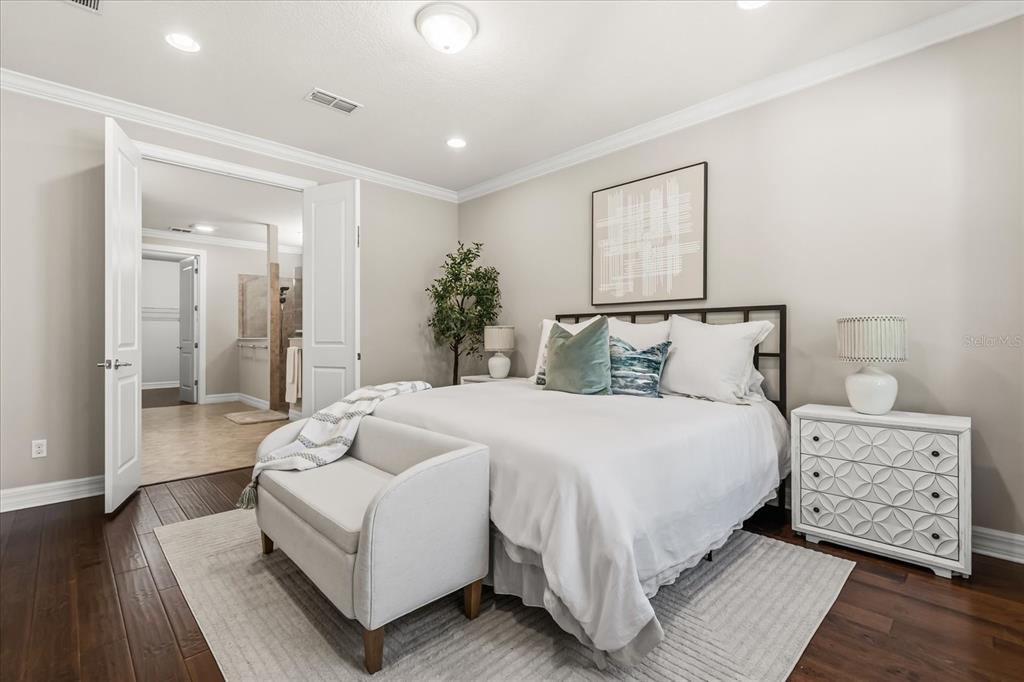 10713 BERRY CREEK Road Orlando, FL 32836 - Photo 13 of 60 a bedroom with a large bed and a window