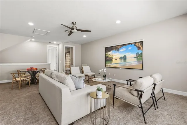 an empty walk in closet with wooden floor