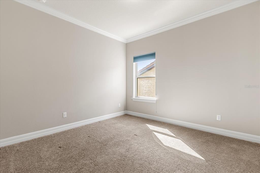 10713 BERRY CREEK Road Orlando, FL 32836 - Photo 26 of 60 an empty room with a window