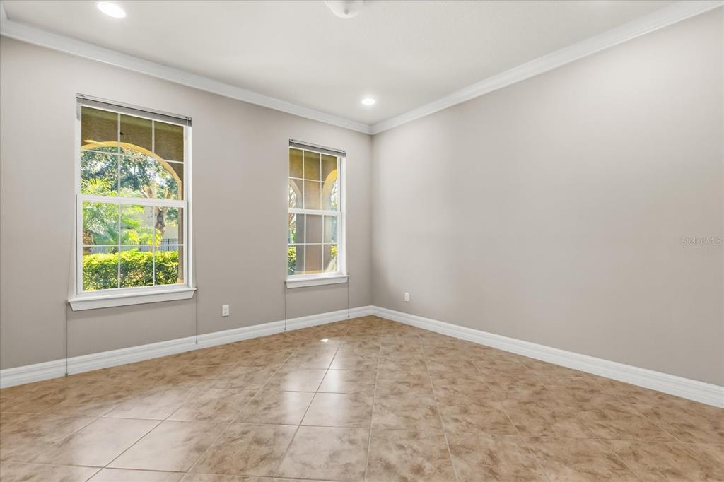 10713 BERRY CREEK Road Orlando, FL 32836 - Photo 29 of 60 an empty room with windows