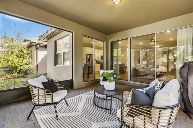 a view of a house with swimming pool and a yard