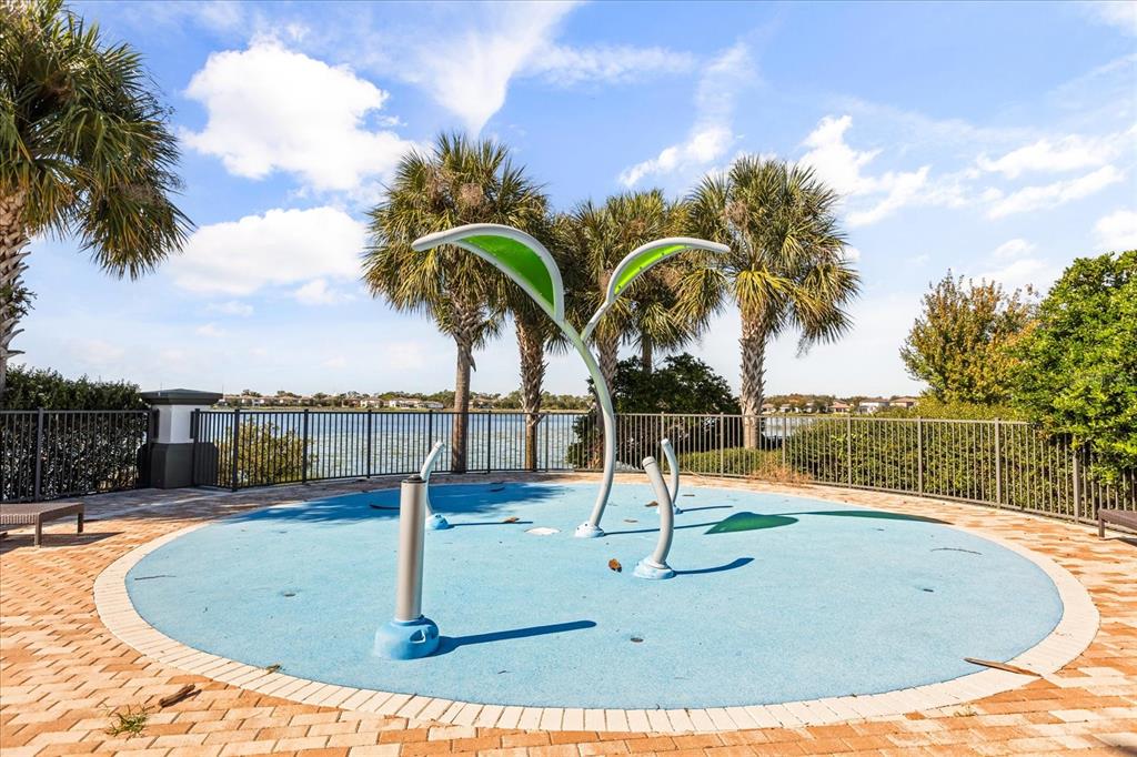 10713 BERRY CREEK Road Orlando, FL 32836 - Photo 44 of 60 a view of a swimming pool with a terrace