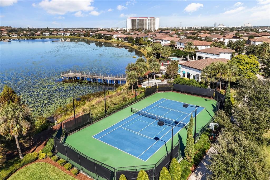 10713 BERRY CREEK Road Orlando, FL 32836 - Photo 44 of 59 a view of a city from a lake