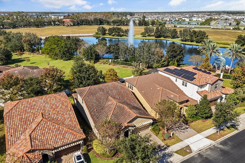 10713 BERRY CREEK Road Orlando, FL 32836 - Photo 55 of 59 an aerial view of a house with outdoor space and lake view