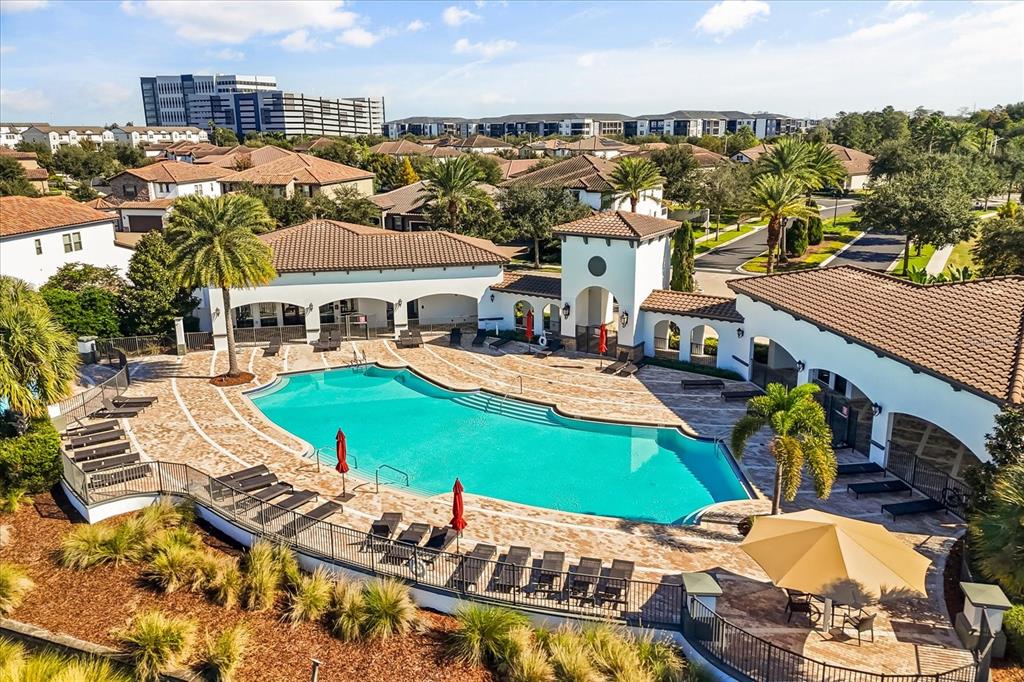 10713 BERRY CREEK Road Orlando, FL 32836 - Photo 58 of 60 a view of a city with lawn chairs