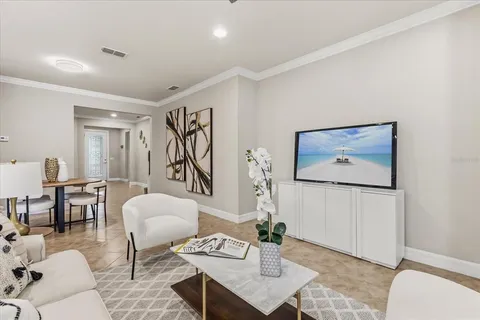 a kitchen with stainless steel appliances granite countertop a sink a stove and a wooden cabinets