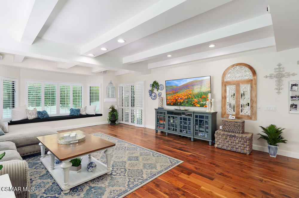 1999 Erbes Road Thousand Oaks, CA 91362 - Photo 12 of 55 a living room with furniture and a flat screen tv