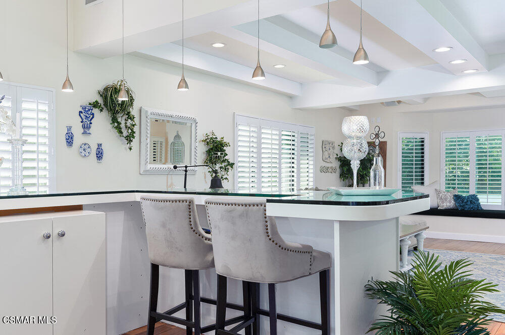 1999 Erbes Road Thousand Oaks, CA 91362 - Photo 17 of 55 a kitchen with a table and chairs in it