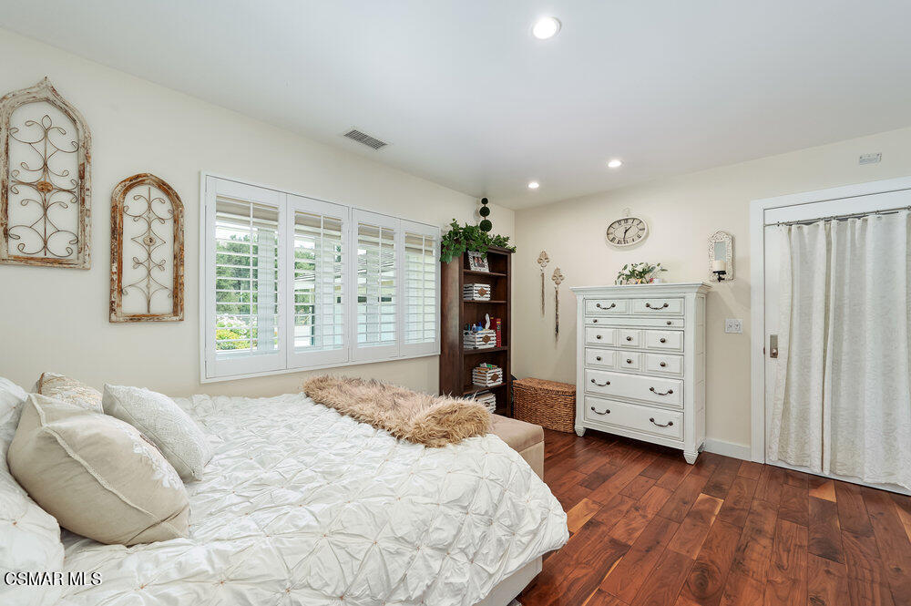 1999 Erbes Road Thousand Oaks, CA 91362 - Photo 31 of 55 a bedroom with a bed and a dresser