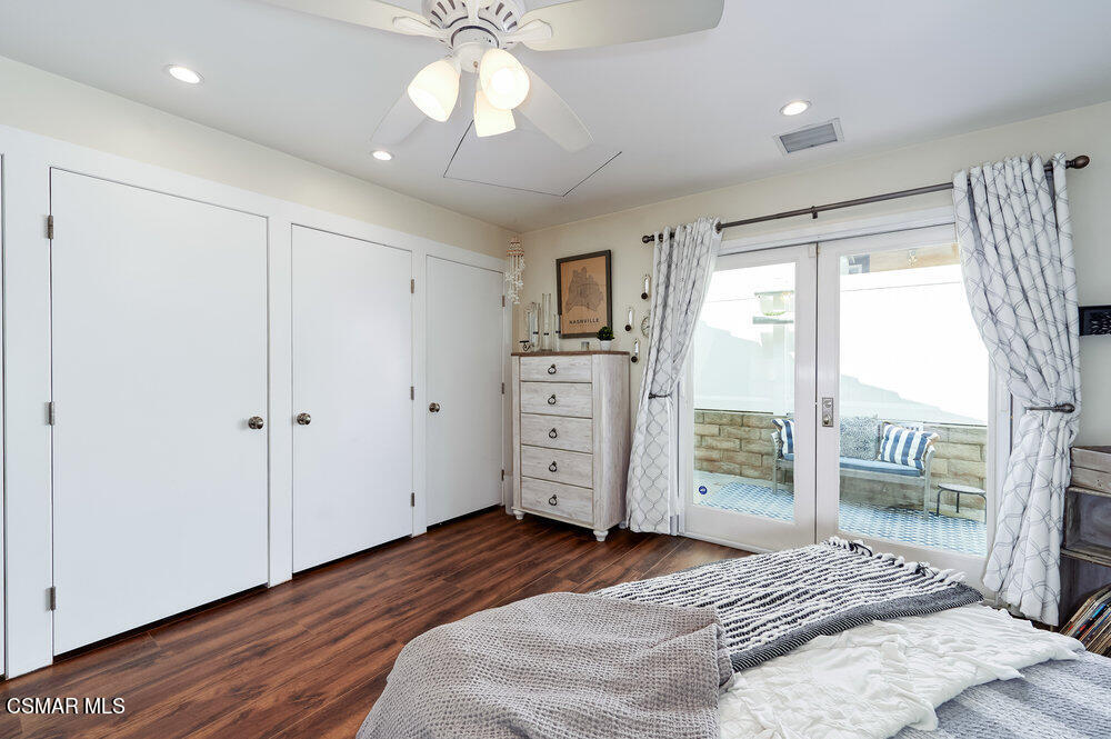 1999 Erbes Road Thousand Oaks, CA 91362 - Photo 40 of 55 a bedroom with a large bed and a window