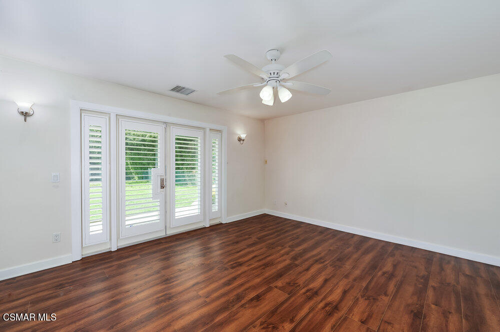 1999 Erbes Road Thousand Oaks, CA 91362 - Photo 43 of 55 a view of an empty room with wooden floor and a window