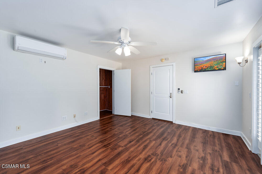 1999 Erbes Road Thousand Oaks, CA 91362 - Photo 45 of 55 wooden floor in an empty room with a window