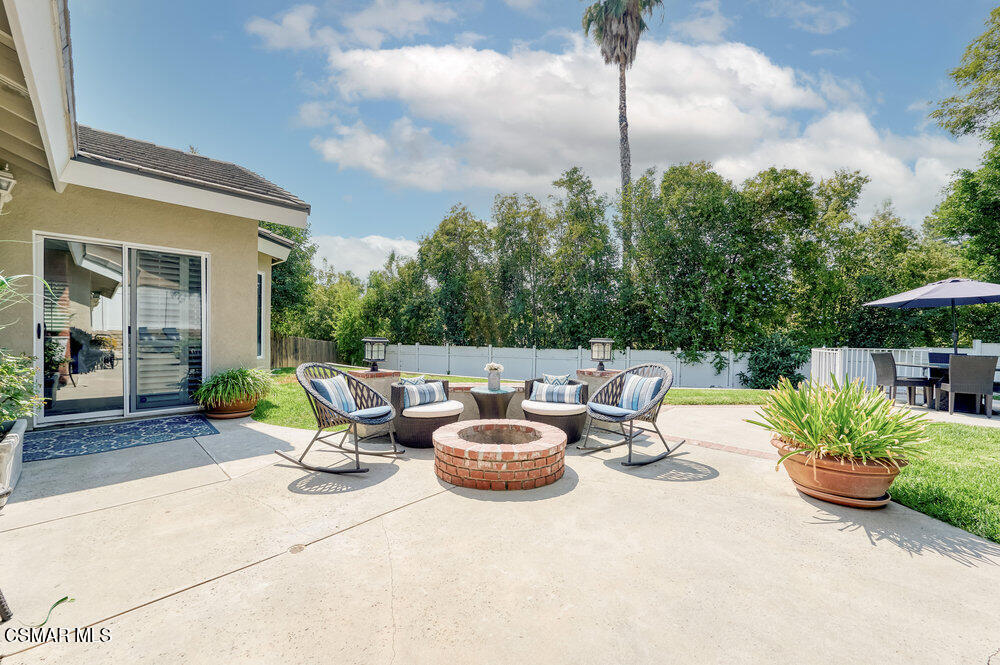 1999 Erbes Road Thousand Oaks, CA 91362 - Photo 46 of 55 a view of a patio with couches table and chairs and potted plants