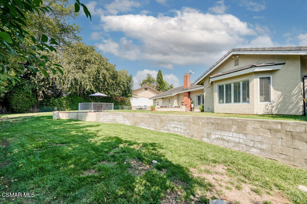1999 Erbes Road Thousand Oaks, CA 91362 - Photo 51 of 55 a front view of a house with a yard