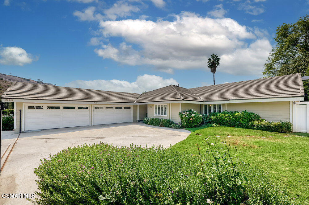 1999 Erbes Road Thousand Oaks, CA 91362 - Photo 53 of 55 a front view of a house with garden