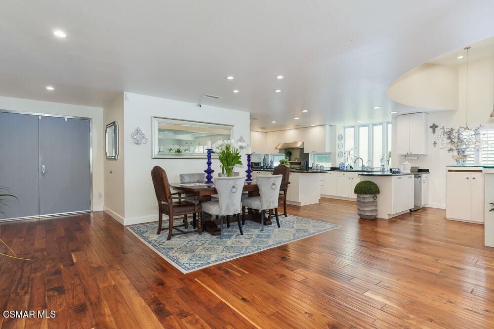 1999 Erbes Road Thousand Oaks, CA 91362 - Photo 8 of 55 a view of a dining room with furniture and wooden floor
