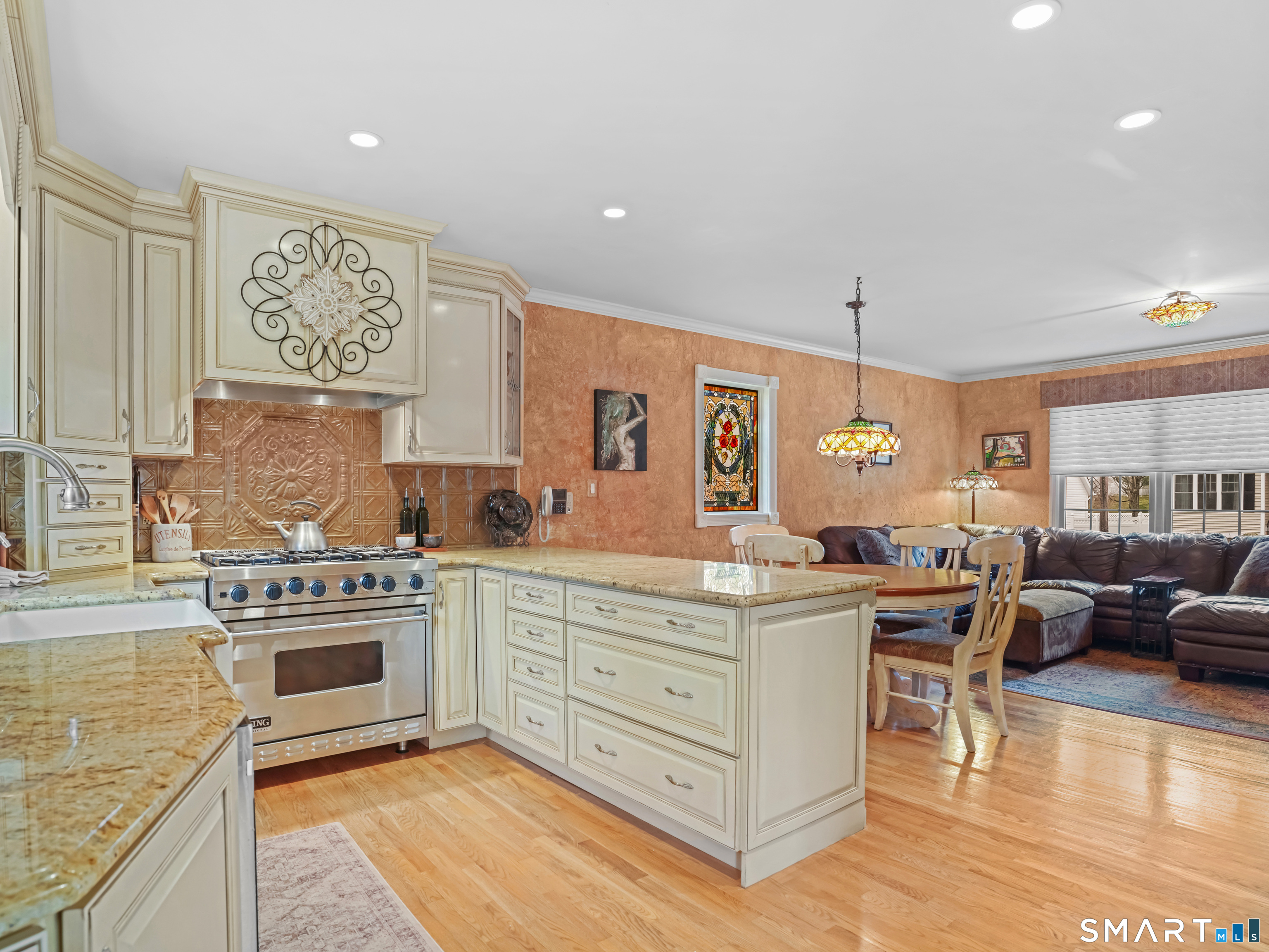 82 Ramapoo Road Ridgefield, CT 06877 - Photo 13 of 40 a kitchen with a stove and cabinets