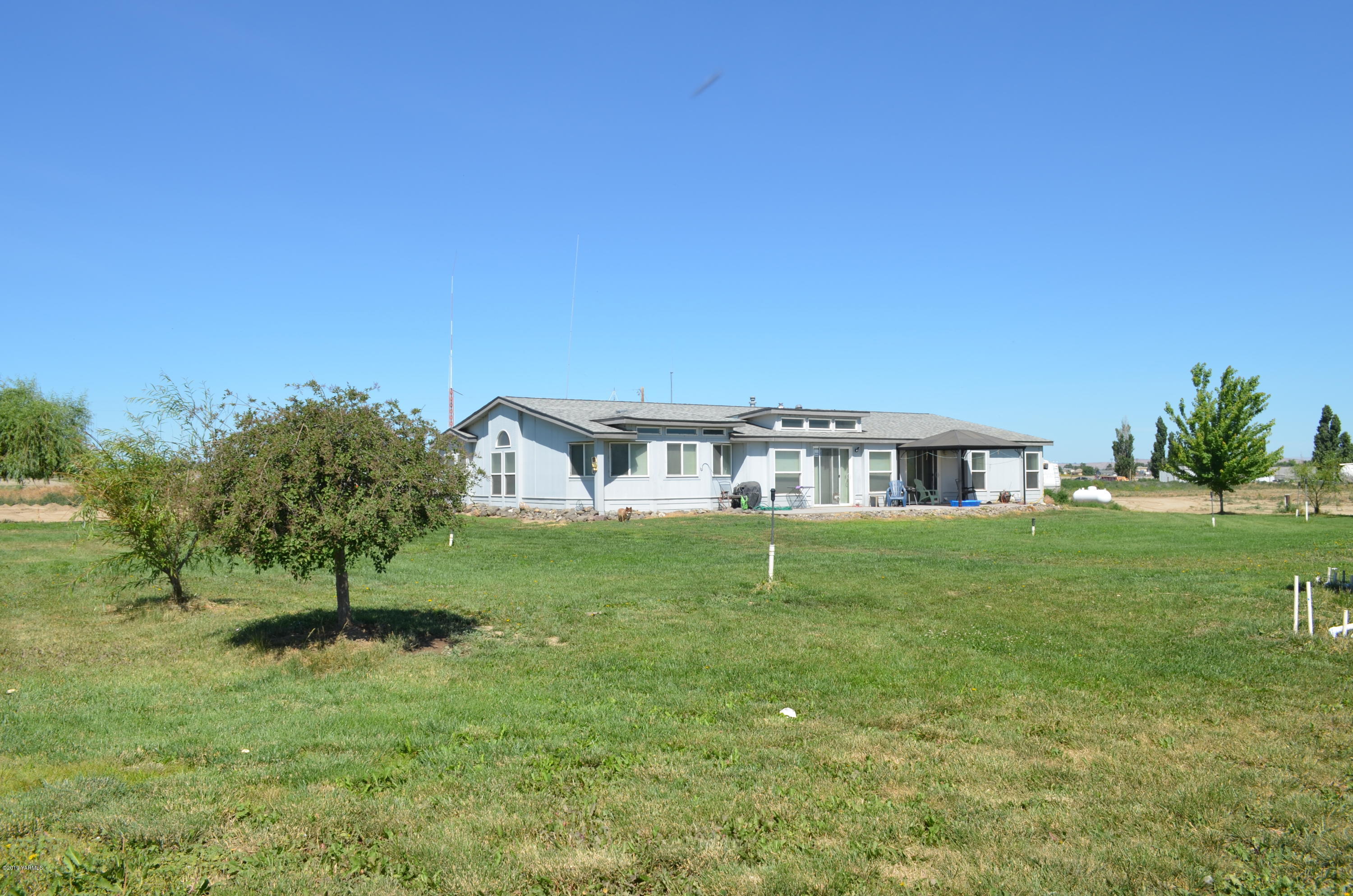330 Gulden Road Mabton, WA 98935 - Photo 40 of 48 a front view of a house with a yard