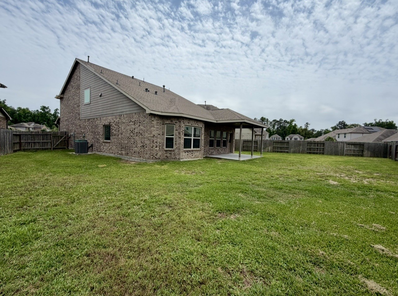 4706 Walnut Willow Ct Spring Spring, TX 77386 - Photo 15 of 17 a front view of a house with garden