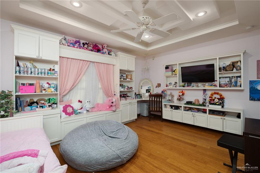 809 Rio Grande Drive Mission, TX 78572 - Photo 21 of 43 a room with furniture and flat screen tv