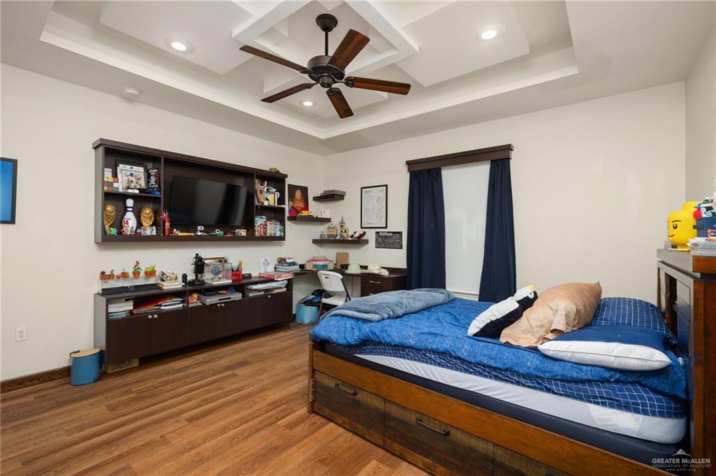 809 Rio Grande Drive Mission, TX 78572 - Photo 23 of 43 a living room with furniture and a flat screen tv