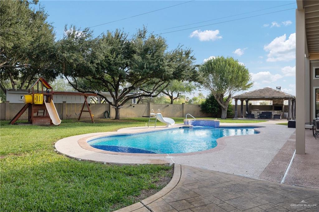 809 Rio Grande Drive Mission, TX 78572 - Photo 34 of 43 a view of outdoor space yard swimming pool and green space