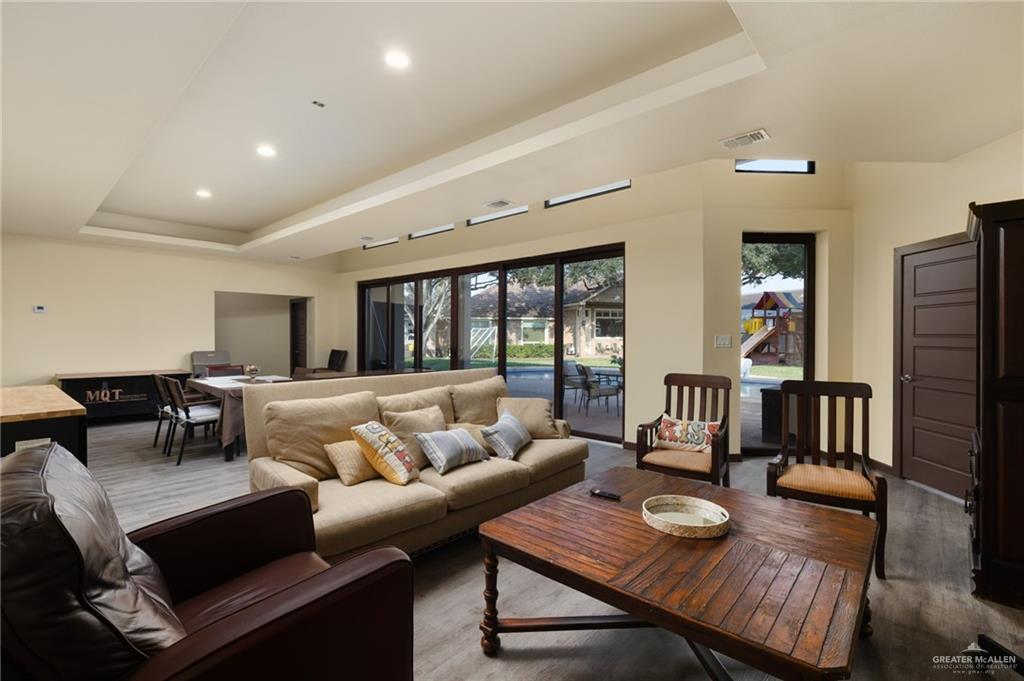 809 Rio Grande Drive Mission, TX 78572 - Photo 35 of 43 a living room with furniture and wooden floor