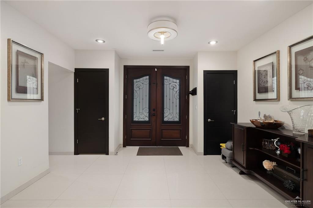 809 Rio Grande Drive Mission, TX 78572 - Photo 4 of 43 Foyer entrance with recessed lighting and light tile patterned floors