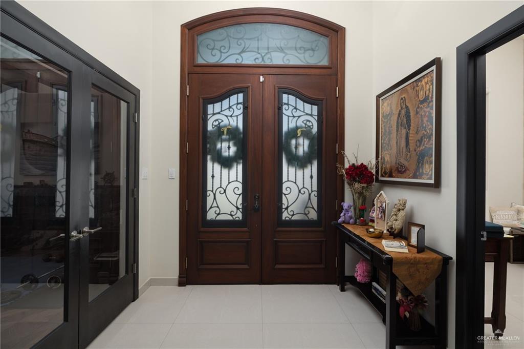 809 Rio Grande Drive Mission, TX 78572 - Photo 5 of 43 Entrance foyer featuring french doors and light tile patterned floors