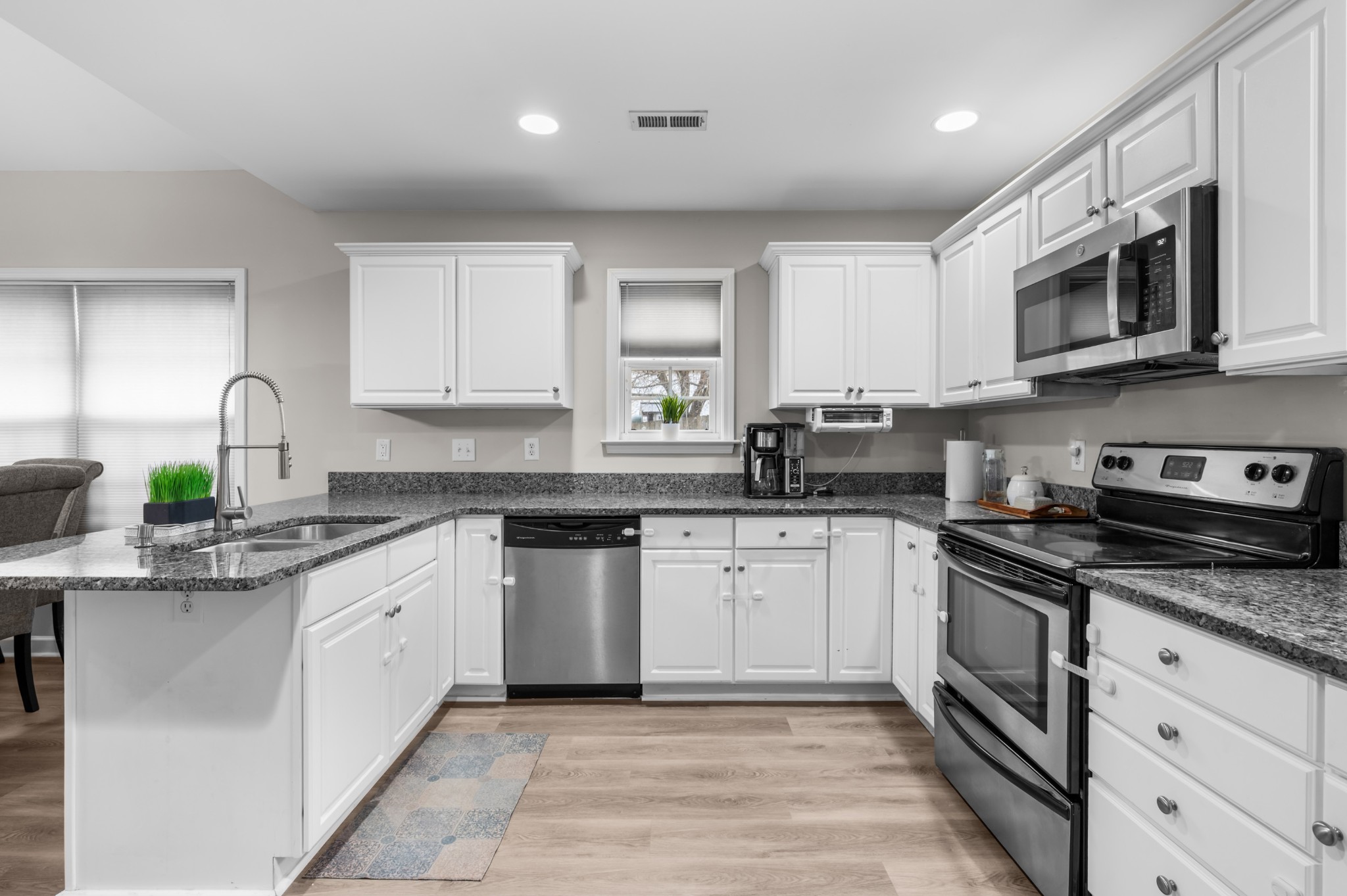 2601 Danbury Circle Spring Hill, TN 37174 - Photo 11 of 31 a kitchen with stainless steel appliances granite countertop a sink and a stove
