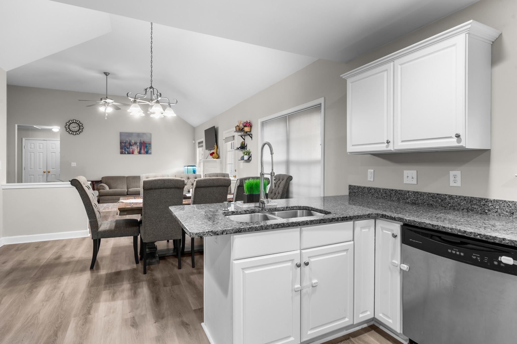 2601 Danbury Circle Spring Hill, TN 37174 - Photo 8 of 31 a kitchen with a table chairs and white cabinets