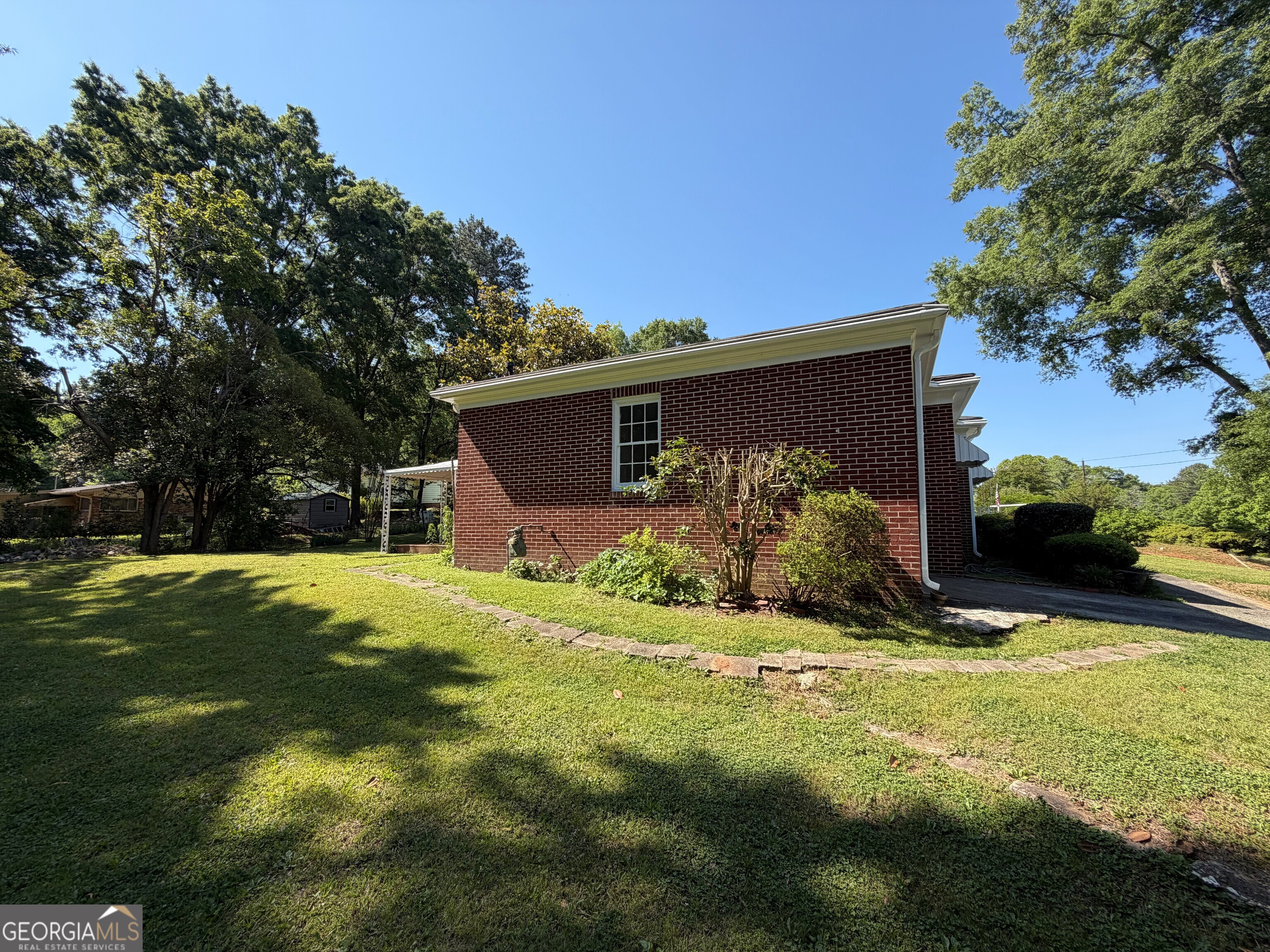 2619 Maple Road Southeast Rome, GA 30161 - Photo 24 of 31 a view of a house with a yard