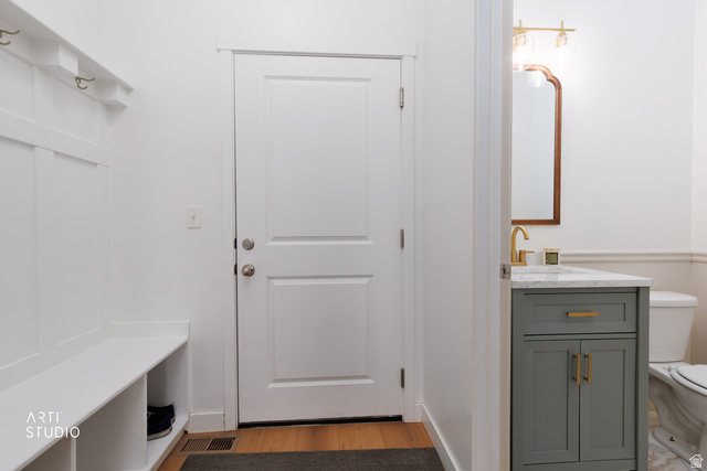 1654 South 730 West Provo, UT 84601 - Photo 12 of 33 Mudroom entry featuring built-in bench seating and wall hooks