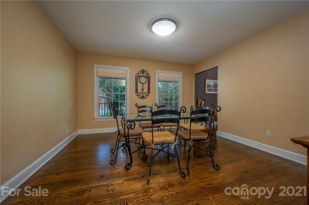 1426 Hayes Road Columbus, NC 28722 - Photo 18 of 45 a view of a dining room with furniture and a window