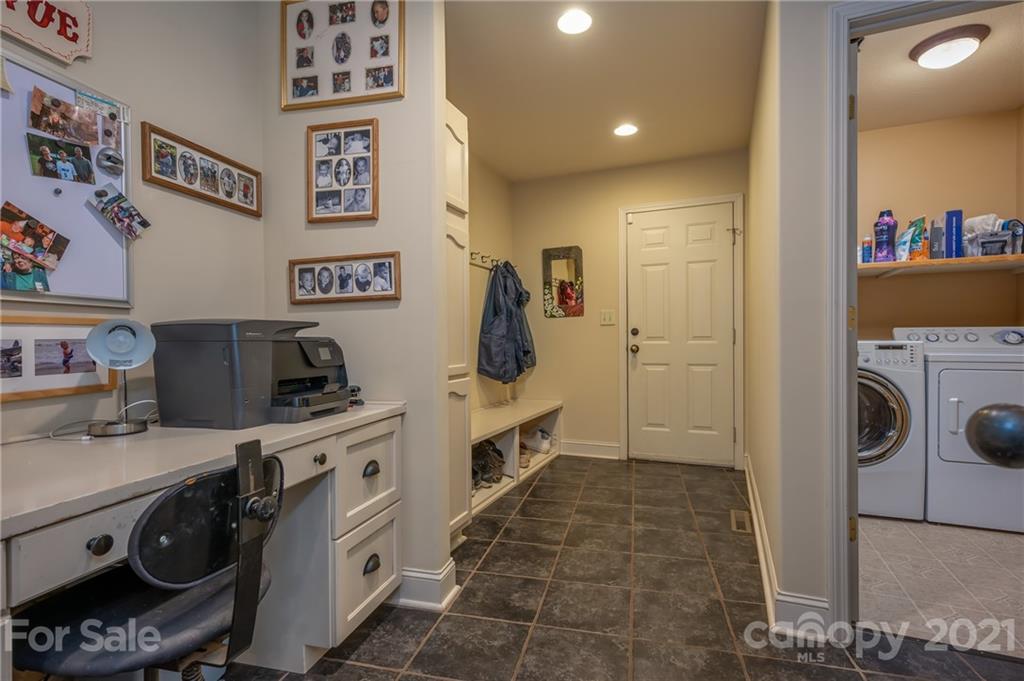 1426 Hayes Road Columbus, NC 28722 - Photo 19 of 45 a view of a kitchen with fridge and rack