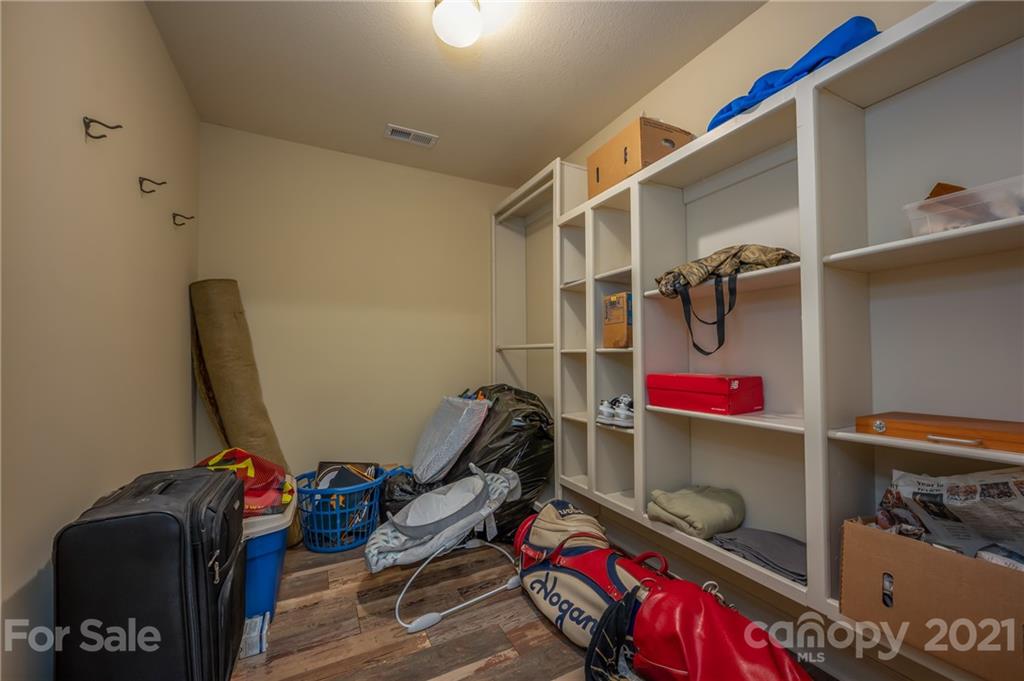 1426 Hayes Road Columbus, NC 28722 - Photo 29 of 45 a room with storage and utility