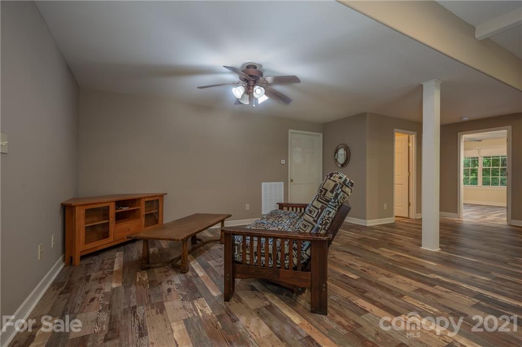 1426 Hayes Road Columbus, NC 28722 - Photo 32 of 45 a workspace with wooden floor
