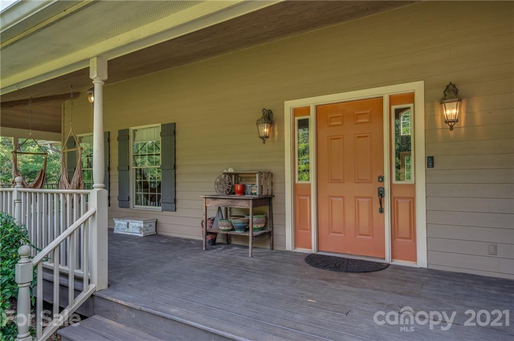 1426 Hayes Road Columbus, NC 28722 - Photo 39 of 45 a view of a balcony with furniture and front door