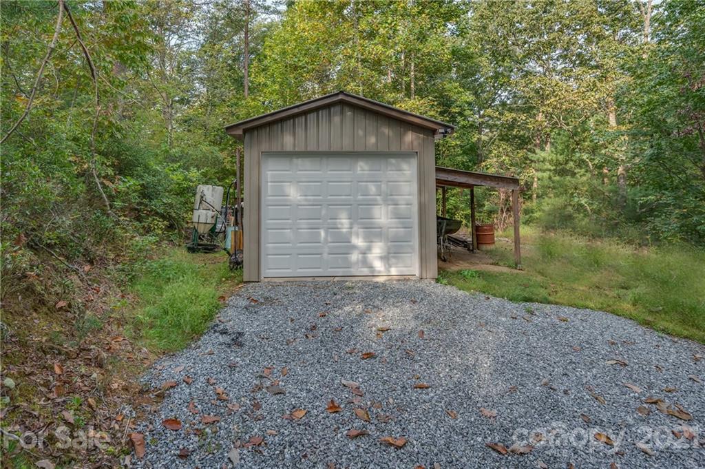 1426 Hayes Road Columbus, NC 28722 - Photo 44 of 45 a front view of a house with a yard