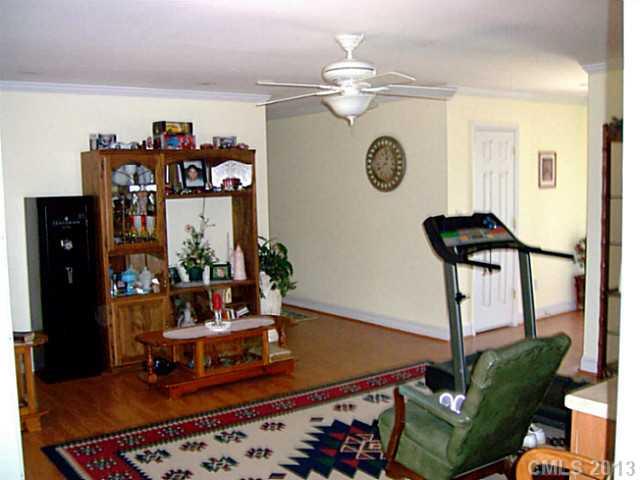 1083 Sharon Road York, SC 29745 - Photo 4 of 16 a view of a dining room with furniture and chandelier