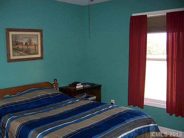 1083 Sharon Road York, SC 29745 - Photo 10 of 16 a bedroom with a bed and a window