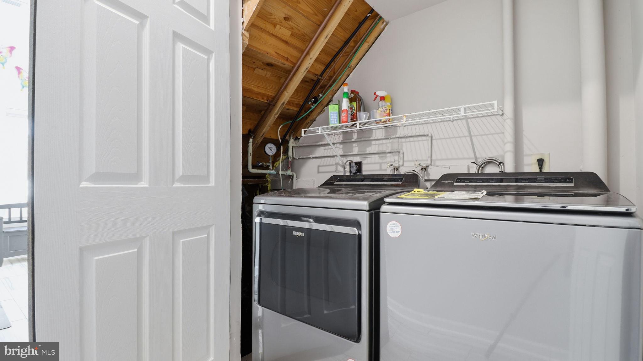 15922 Edgeview Terrace Bowie, MD 20716 - Photo 8 of 41 a utility room with dryer and washer